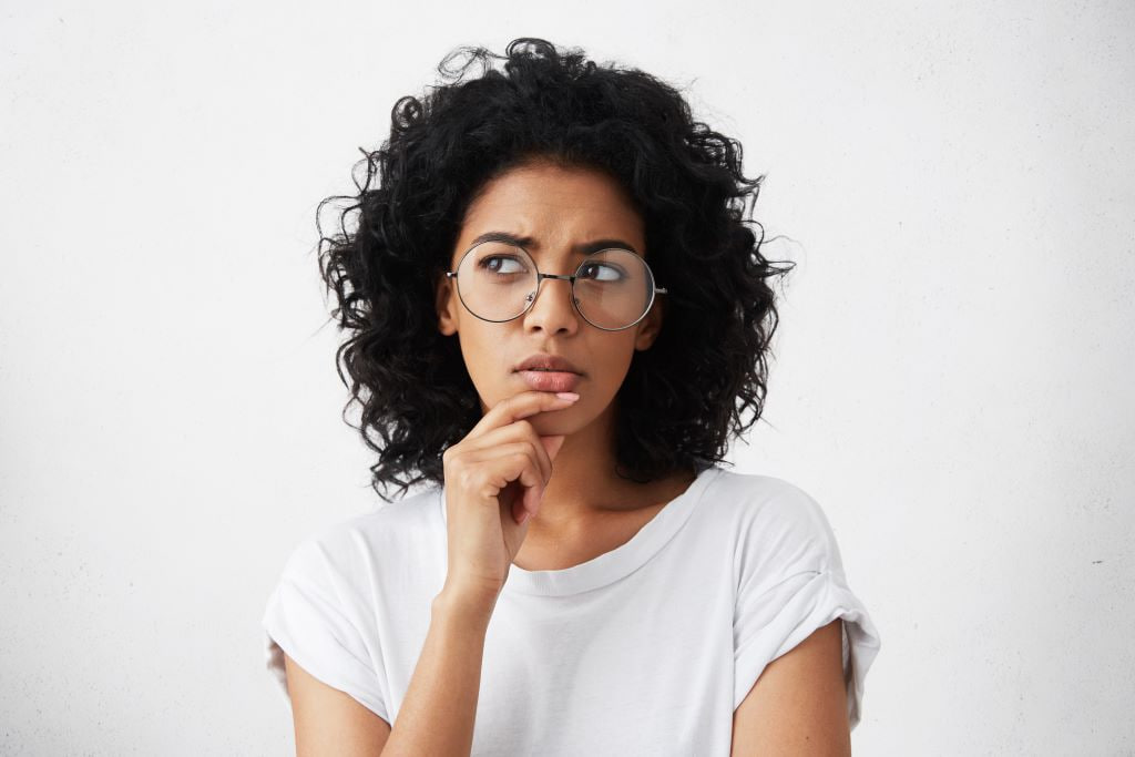 A woman thinking about taxes